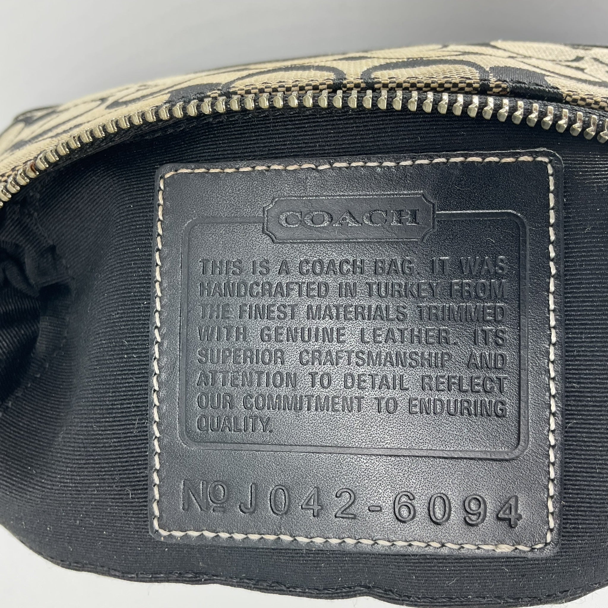 COACH signature accessory pouch in black canvas